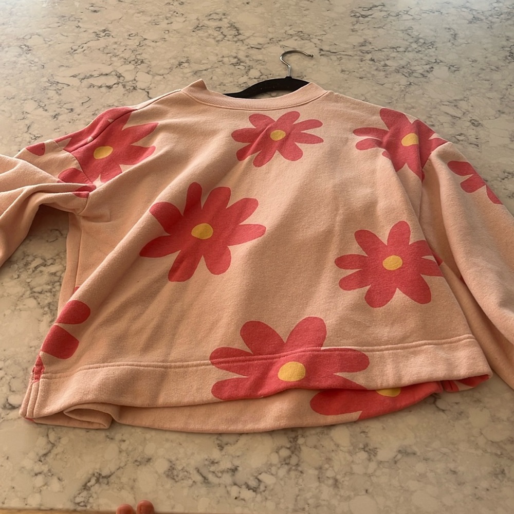 Flower sweater. Very cute and comfortable. Barely worn